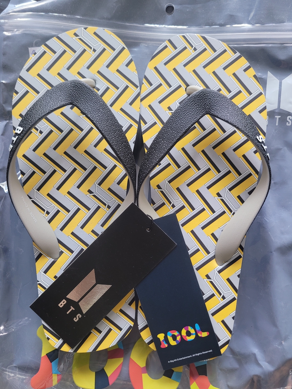BTS Yellow Geometric Flip Flops